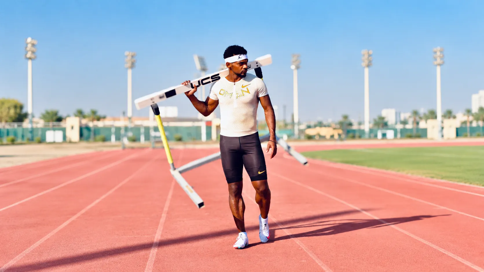 Athlete resting on a bench between training sessions