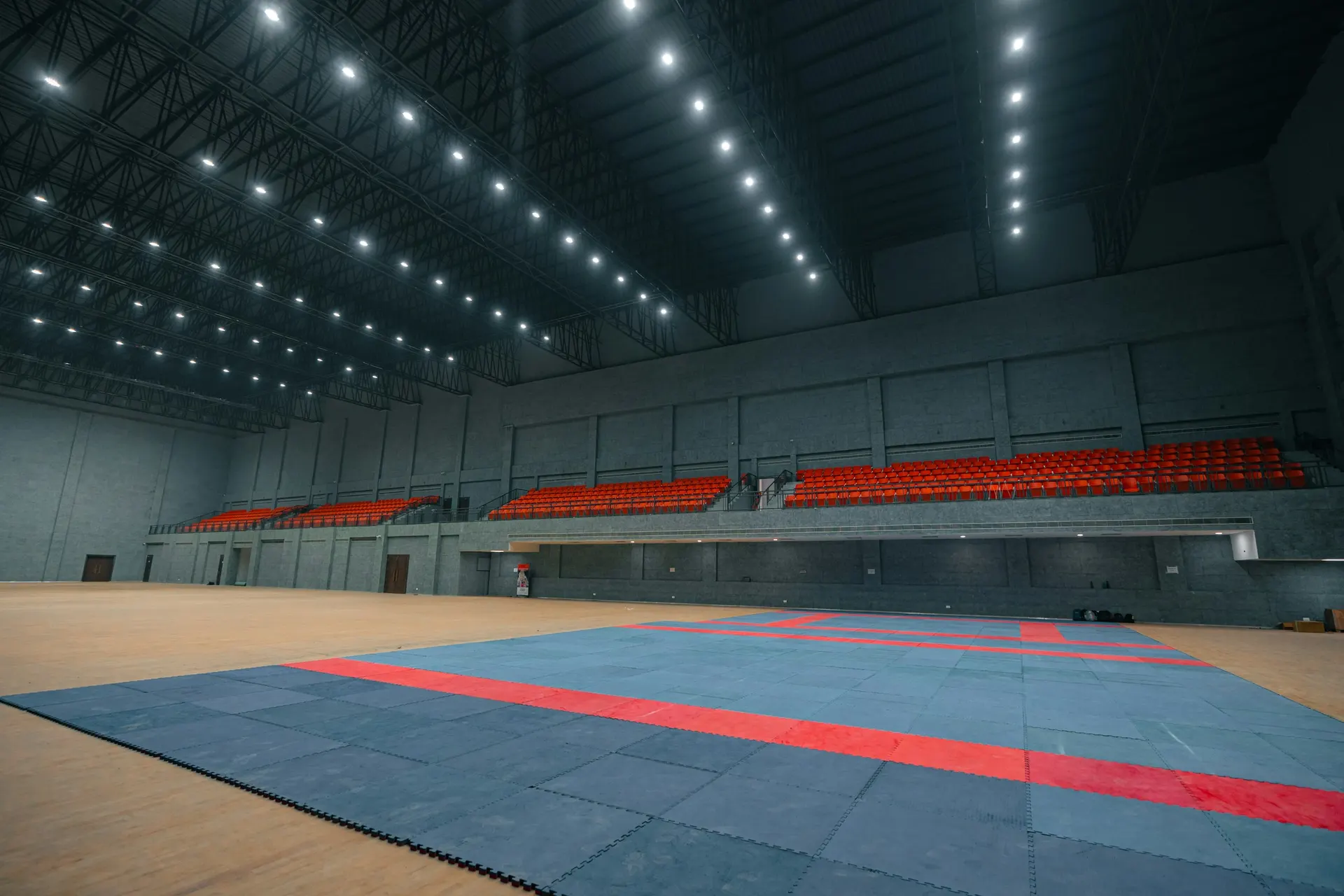Indoor arena with a large competition mat area